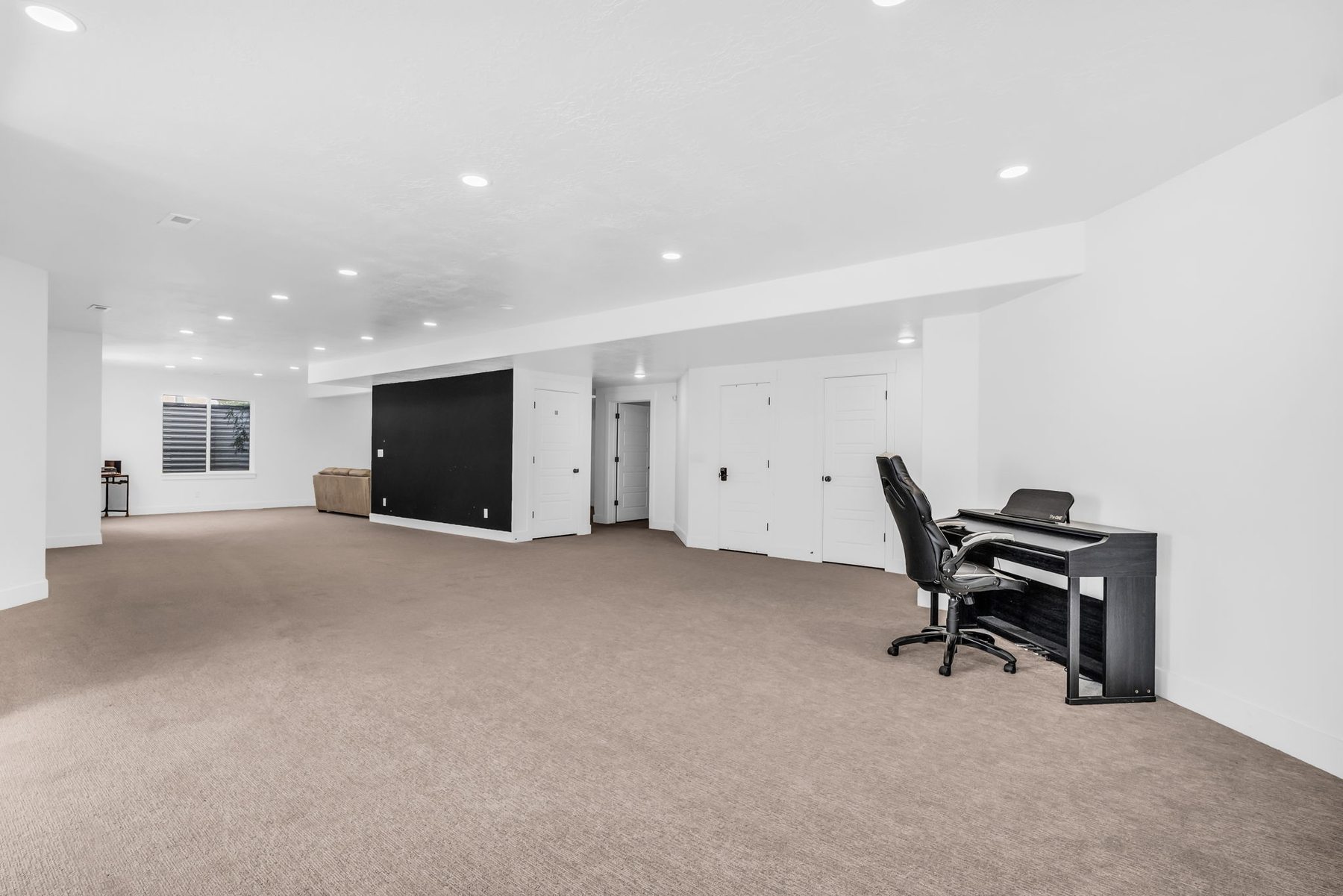 Finished basement recreation room at 12517 N Minots Ledge Dr